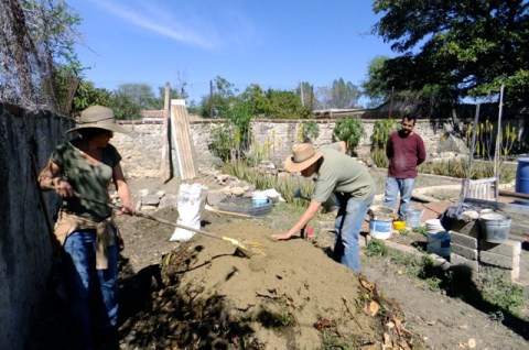The day before this event several members borrowed a truck and went to the local stockyard to shovel manure into bags.